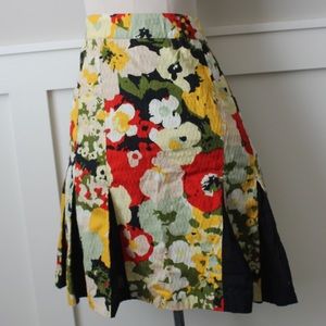 Anthro floral navy pop pleats skirt